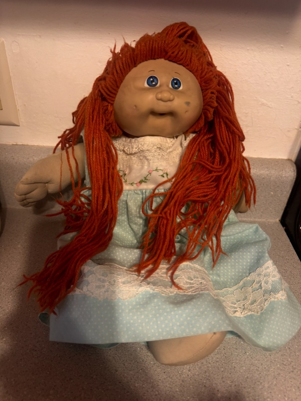Vintage Cabbage Patch Kids doll features a distinctive Xavier Roberts signature